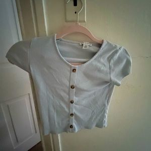 Cute baby blue shirt ! For 9-10 year olds (XS)